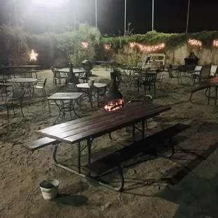 Outdoor patio area with the occasional cornhole tournament.