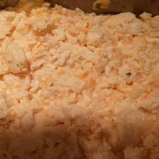 Scrambled eggs with cheese. Plain also offered