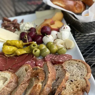 Combination charcuterie and fruit and cheese plate, soft pretzels