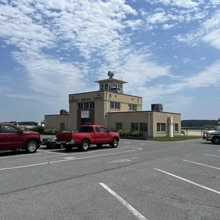 two trucks parked in a parking lot
