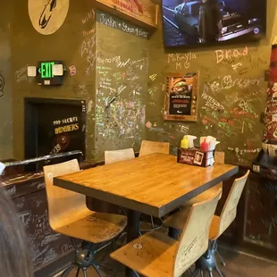 a table and chairs in a restaurant