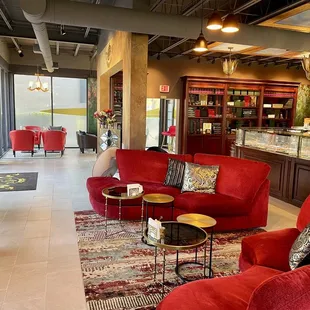 red couches and coffee tables