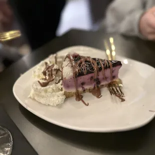 The blueberry Cheesecake with milk chocolate drizzle.