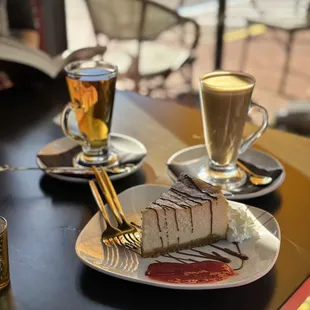 Cotton cheesecake, flat white, and hot tea.