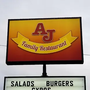 a sign for salads, burgers and gyros