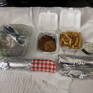Large Greek Salad, fried FriedTomatoes, GYRO SANDWISH MEAL, chicken shawarma sandwich, extra pita and tzatziki.