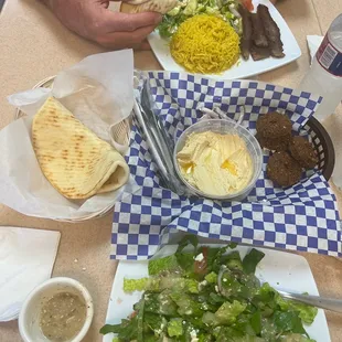 We got a Falafel Plate, and order of hummus and pita, and a Gyro Plate.