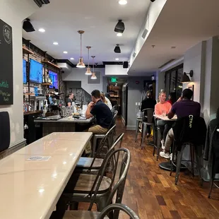 people sitting at a bar