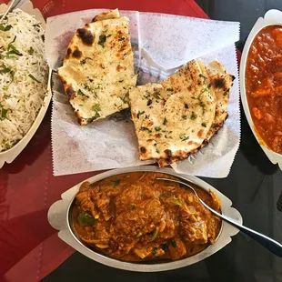 Rice (Left) Garlic Naan (Middle) Chicken Vindaloo (Right) Lamb Do Piaza (Bottom)