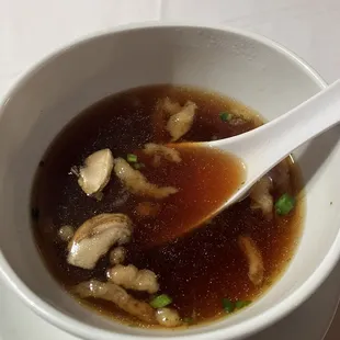 a bowl of soup with a spoon
