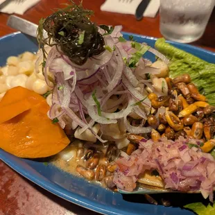 Mixed ceviche (fish+seafood), very nice with side of potato, yam, fried corn, and steamed huge corn pellets.