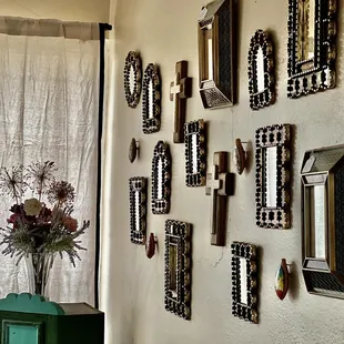 a wall of mirrors on the wall