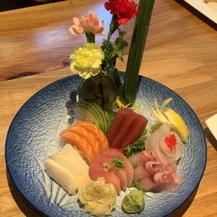 a plate of sushi on a table