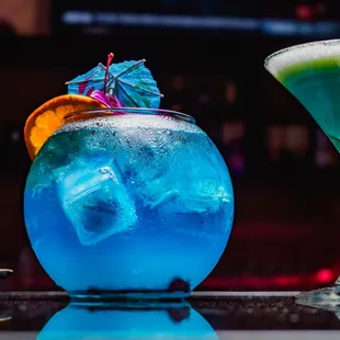 two cocktails on a bar counter
