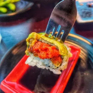 Enjoying Sushi with Soy Sauce