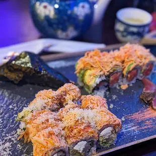 a plate of sushi on a table