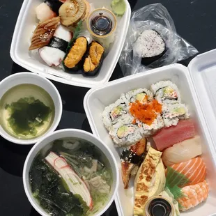 Takeout Kamogawa Udon ($8.50), Sushi Lunch Plate Large ($12), and various nigiri (surf clam, scallop, river eel, octopus, sea urchin)