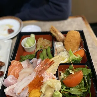 KAISEN BENTO 31.99 Assorted Sashimi over Sushi Rice, Salad, Rice, Fruits