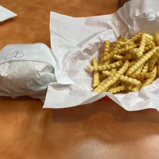 My burger and crinkle cut fries