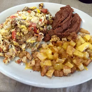 Chicharron and egg plate w bean and potatoes.....(pork skins &amp; egg)