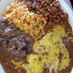 AJ's special plate: 2 enchiladas, carne Guisada rice and beans