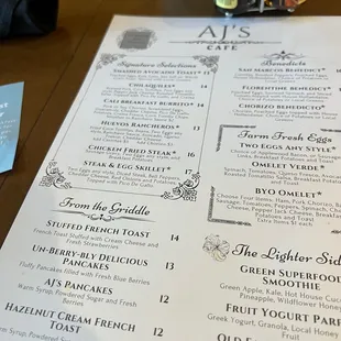 a menu on a wooden table