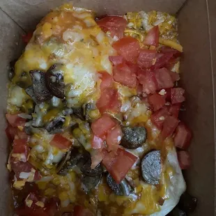 Breakfast Burrito. Apparently it is smothered!