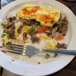 Fresh veggie and sausage omelette. Sausage tasted home-made delicious.