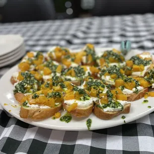 Butternut squash with kale pesto and ricotta crostini