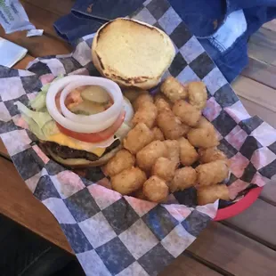 Deluxe burger with tots