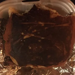This is not char. It is a properly skillet-toasted bun on a grilled cheese. I didn't even know that was possible without thin slices!