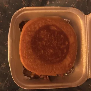 Brisket grilled cheese comes in a small styrofoam container, but is really filling.