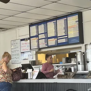 a man and a woman at the counter