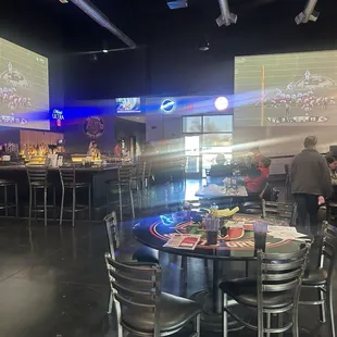 Large TVs and nice bar area.