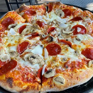 a pepperoni and mushroom pizza