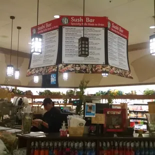 AJ's Sushi Bar in the back left hand corner of store next to beer sales.