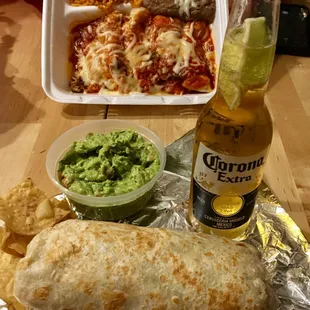 Baja Burrito with chips and Guacamole with a Dinner plate of Enchilladas with red sauce and beans and rice. Their Guacamole is outstanding!