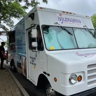 a food truck parked on the side of the road
