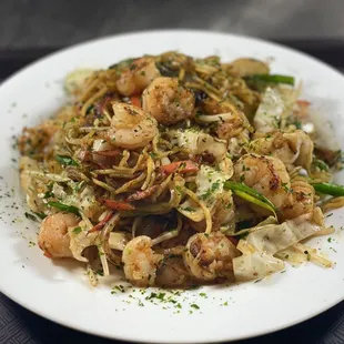 Shrimp Yakisoba -  Veges and chicken sautéed in special sauce with thin egg noodle