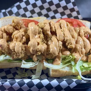 Fried shrimp po-boy - Special tempura batter deep fried fresh shrimp with homemade spicy aioli (Pink sauce)
