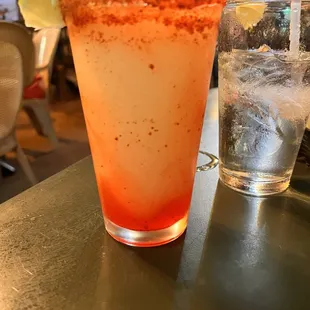 a margarita and a glass of water