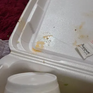 The black curly hair I found in my salad,  5th bite.. Gross.. this place is disgusting. No quality control.