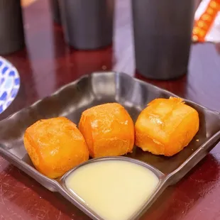 a plate of fried food on a table