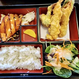 a bento box of food