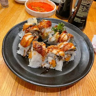 a plate of sushi on a table