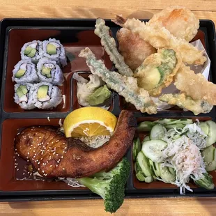 a bento box with a variety of food items