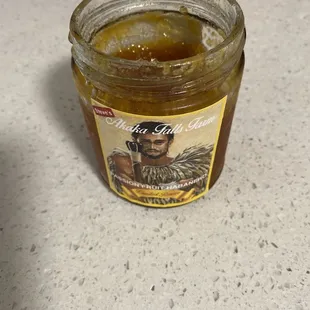 Passion fruit habanero - heat grows. Eat with cream cheese on crackers!