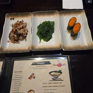 Appetizers - squid salad, seaweed salad, and masago roll