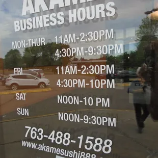 Hours of operation, front entry door.