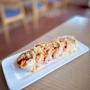 Tuna Crunch Roll: spicy tuna, cream cheese &amp; cucumber inside, wrapped in soy paper and topped with tempura &amp; sauces - lovely!